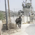 Israeli soldiers stand on guard at a checkpoint near Nablus, in the north of the West Bank, on July 25, 2024. Photo: Nasser Ishtayeh/SOPA Images/Sipa USA via AP