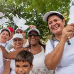 A group of Cubans pose for a photo during a protest demanding the closure of the United States' Guantánamo Naval Base and Prison in occupied Cuban territory, May 5, 2024.. Photo: Roger D. Harris.
