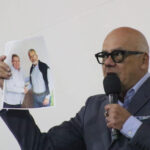 Venezuelan National Assembly President Jorge Rodríguez shows a photo of far-right former presidential candidate Edmundo González and former CNE rector Juan Carlos Delpino shaking hands. Photo: National Assembly.