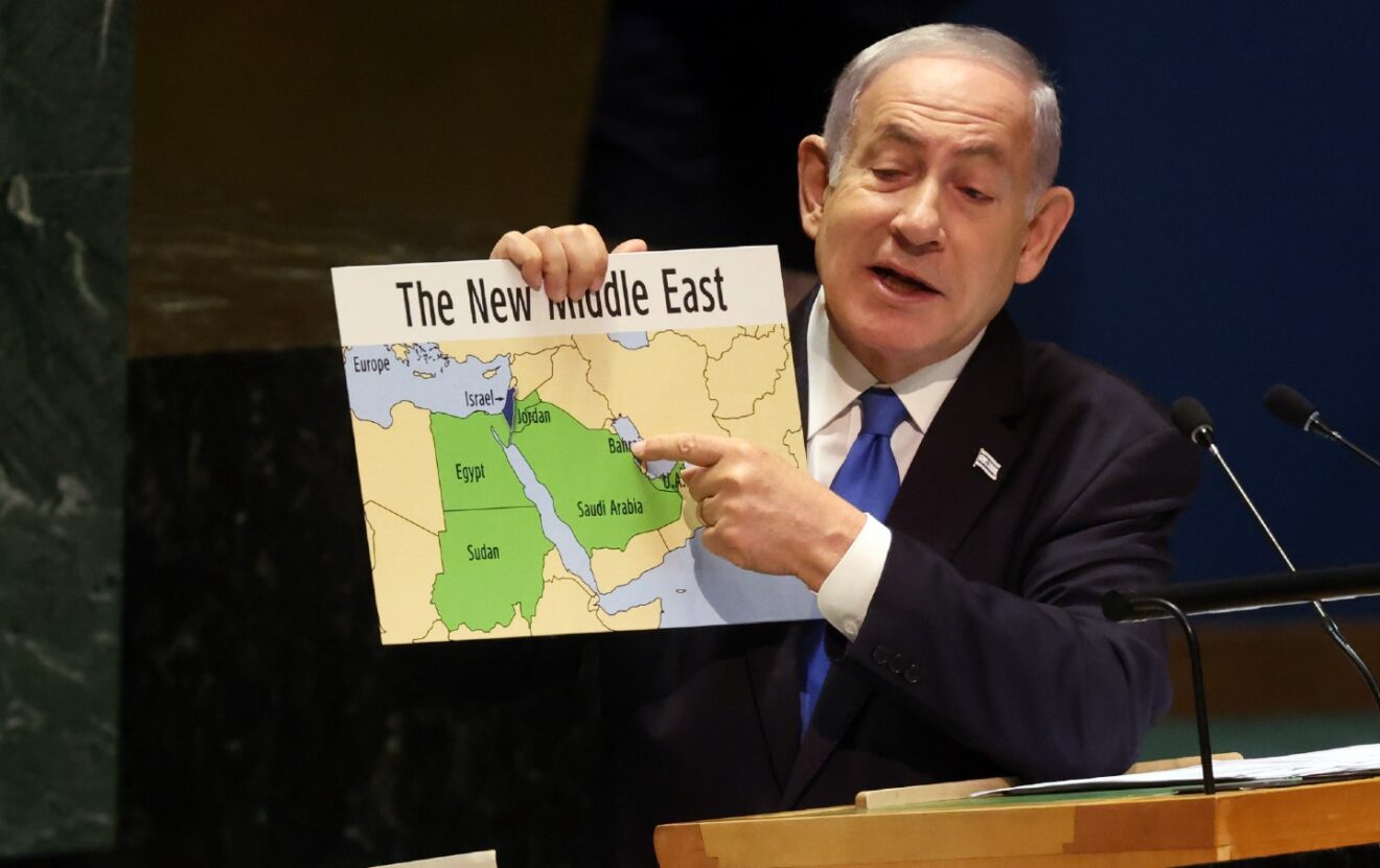 During a speech before the United Nations General Assembly on September 22, 2023, Zionist Prime Minister Benjamin Netanyahu holds up a map that shows "Israel" stretching “from the river to the sea.”