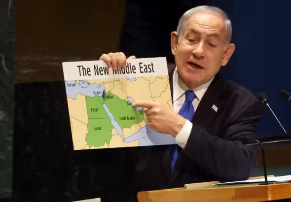 During a speech before the United Nations General Assembly on September 22, 2023, Zionist Prime Minister Benjamin Netanyahu holds up a map that shows "Israel" stretching “from the river to the sea.”