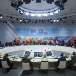 Roundtable chaired by Russian President Vladimir Putin during Kazan’s BRICS summit. Photo: Sergey Bobylev/Photohost agency.