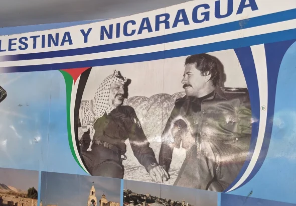 Poster on Nicaragua-Palestine relations, featuring the late Palestinian leader Yasser Arafat (left) and Nicaraguan President Daniel Ortega (right) during the latter's state visit to occupied Palestine in 1981. Photo: X/@BenjaminNorton.