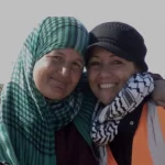 Venezuelan international brigadist Valeria Cortés with a Palestinian woman. Photo: Valeria Cortés.