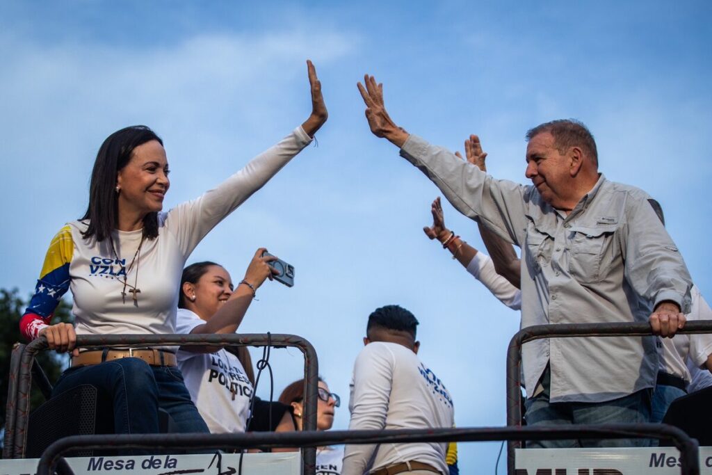Far-right Venezuelan opposition politician María Corina Machado (left) and former presidential candidate Edmundo González waving at supporters during a political rally before the July 28 presidential elections. Photo: X/@EdmundoGU/file photo.