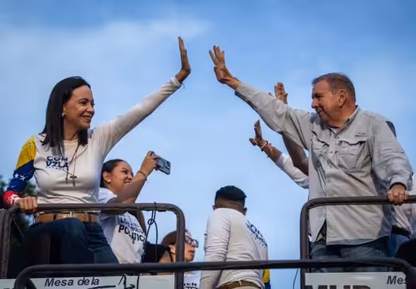 Far-right Venezuelan opposition politician María Corina Machado (left) and former presidential candidate Edmundo González waving at supporters during a political rally before the July 28 presidential elections. Photo: X/@EdmundoGU/file photo.