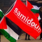 Dozens of protesters from the Samidoun organization gathering in front of the Muelheim train station in Cologne, Germany, on April 15, 2023, to commemorate Palestinian Prisoners’ Day. Photo: Ying tang/Nurphoto via zuma press apaimages.