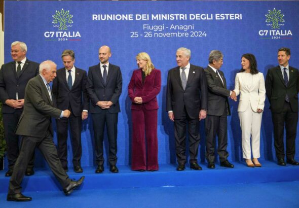 European Union foreign policy chief Josep Borrell, front, arrives late to pose for a family photo with, from left, Ukrainian Foreign Minister Andrii Sybiha, US Secretary of State Antony Blinken, French Foreign Minister Jean-Noël Barrot, Canada's Foreign Minister Melanie Joly, Italian Foreign Minister Antonio Tajani, Japanese Foreign Minister Takeshi Iwaya, German Foreign Minister Annalena Baerbock, Britain's Foreign Office Political Director Christian Turner at the G7 Summit of foreign Ministers in Italy, Tuesday, Nov. 26, 2024. Photo: Alessandra Tarantino/AP.