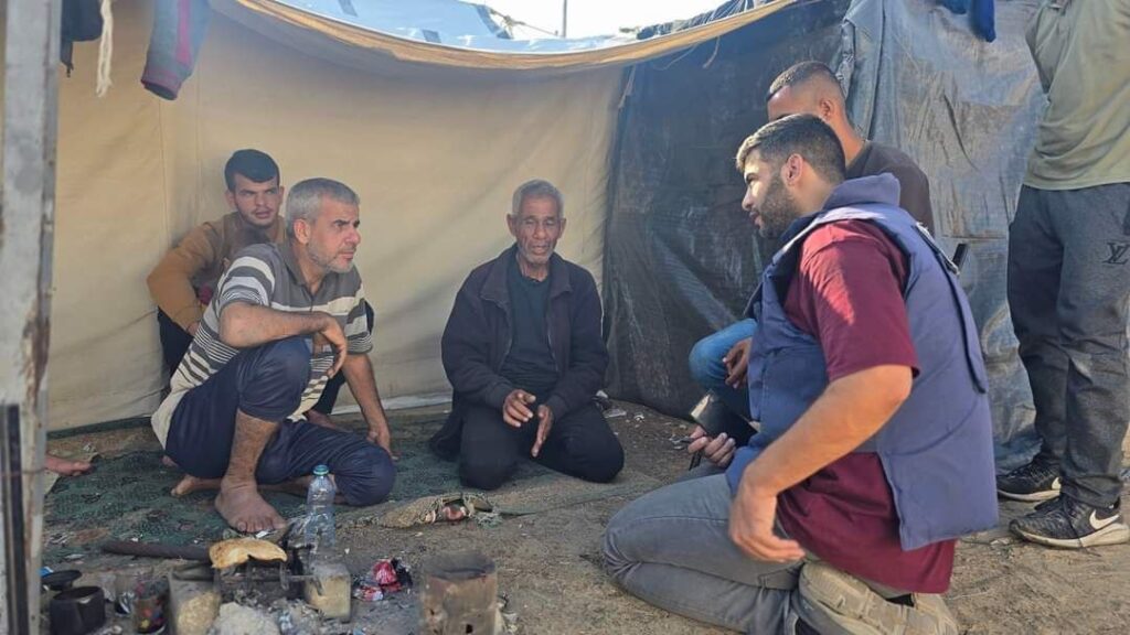 Al-Akhbar journalist Yousef Fares interviews displaced Palestinians in North Gaza on November 12, 2024. Photo: Yousef Fares/Telegram
