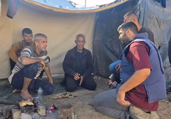 Al-Akhbar journalist Yousef Fares interviews displaced Palestinians in North Gaza on November 12, 2024. Photo: Yousef Fares/Telegram