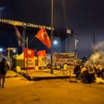 Turkish activists stage a sit-in outside the Port of Haydarpasa in Istanbul. Photo: Guldenay Sonumut.