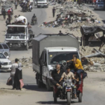 Palestinians flee the eastern part of Khan Younis as they make their way after they were ordered by Zionist Occupation to evacuate their neighborhoods in Khan Younis in the southern Gaza Strip July 22, 2024. Photo credit: Mahmoud Issa/IMAGO/Reuters.