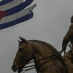 A Cuban flag shredded by the winds of Hurricane Rafael flies above the statue of General Calixto Garcia in Havana, Cuba, November 6, 2024. Photo: Morning Star/File photo.