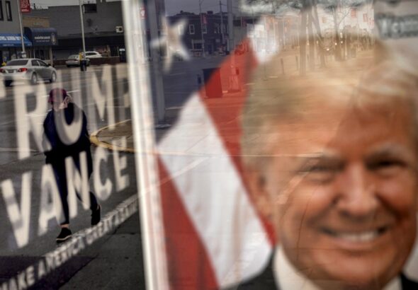 An image of Republican presidential nominee former President Donald Trump hangs in the window of a campaign office in Hamtramck, Michigan, November 4, 2024. Photo: The Morning Star/File photo.