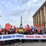 Pro-Cuba solidarity activists in Paris call for the end of the US blockade against Cuba. Photo: ICAP.