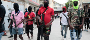 Soldiers of the G9 Family and Allies march in a protest against Prime Minister Ariel Henry in Port-au-Prince on Sep. 19, 2023. Photo: Odelyn Joseph/AP.