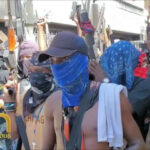 In-October-2024-Viv-Ansanm-soldiers-in-lower-Delmas-in-a-press-conference-to-give-the-reasons-for-their-struggle-and-fight-with-Solino-747x420