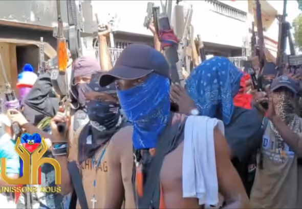 In-October-2024-Viv-Ansanm-soldiers-in-lower-Delmas-in-a-press-conference-to-give-the-reasons-for-their-struggle-and-fight-with-Solino-747x420