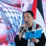 Palestinian resistance leader Leila Khaled speaks at the International Conference in Solidarity with Palestine in Caracas, Venezuela, November 29, 2024.