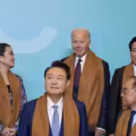 US President Joe Biden stands in the back row, center, next to Thailand's Prime Minister Paetongtarn Shinawatra, left, and Vietnam's President Luong Cuong, right, above Indonesia's President Prabowo Subianto, bottom left, South Korea's President Yoon Suk Yeol, bottom center, and Malaysia's Prime Minster Anwar Ibrahim, bottom right, as they pose with other APEC leaders for a family photograph at the APEC Summit in Lima, Peru on Nov 16, 2024. Photo: Manuel Balce Ceneta (AP).
