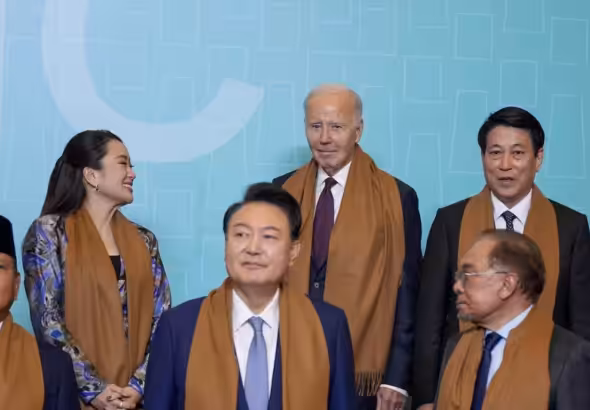 US President Joe Biden stands in the back row, center, next to Thailand's Prime Minister Paetongtarn Shinawatra, left, and Vietnam's President Luong Cuong, right, above Indonesia's President Prabowo Subianto, bottom left, South Korea's President Yoon Suk Yeol, bottom center, and Malaysia's Prime Minster Anwar Ibrahim, bottom right, as they pose with other APEC leaders for a family photograph at the APEC Summit in Lima, Peru on Nov 16, 2024. Photo: Manuel Balce Ceneta (AP).