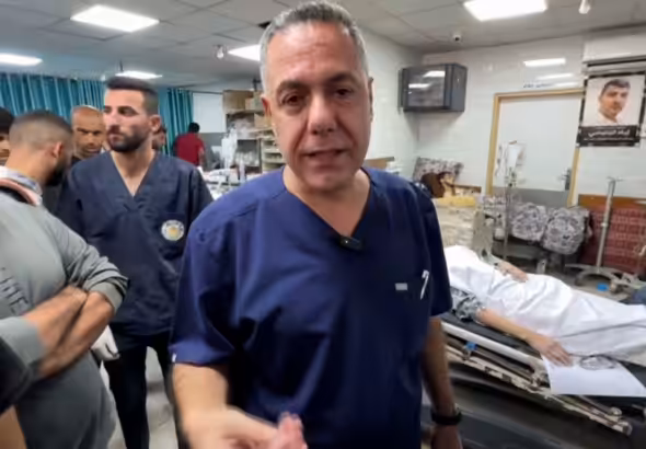 Dr. Hussam Abu Safia inside Kamal Adwan Hospital, northern Gaza, prior to his injury by a occupation quadcopter. Photo: CNN.