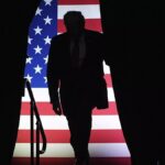 Silhouette of Donald Trump with a US flag in the background. Photo: Alba Ciudad/agencies.