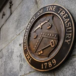 The symbol of the US Department of the Treasury on its headquarters. File photo.