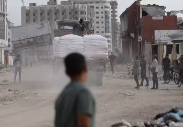 A truck carrying aid enters the Gaza Strip in May. Photo: Daoud Abu Alkass/AFP