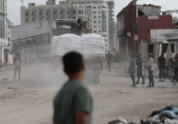 A truck carrying aid enters the Gaza Strip in May. Photo: Daoud Abu Alkass/AFP
