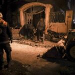 Residents inspect the site of an airstrike in Idlib, Syria, on Dec 1, 2024. Photo: AP.