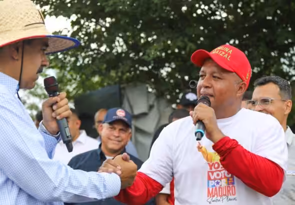 Featured image: Venezuela's Minister for Communes Angel Prado shakes hands with President Nicolás Maduro during a visit to the Comuna El Maizal in Lara state, July 2024. Photo: Presidential Press/file photo.