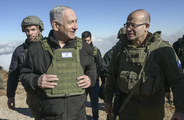 Israeli ruler Benjamin Netanyahu, left, visits Israeli invasion forces in the so called buffer zone inside Syria, Tuesday, December 17, 2024. Photo: Israeli occupation entity Press Office/AP.