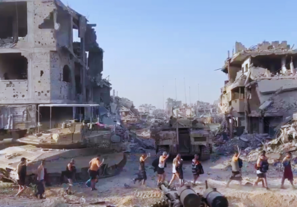 'Israeli' army forces doctors and patients to head south on foot, half-naked, in the freezing cold. Photo: Palestine Chronicle.