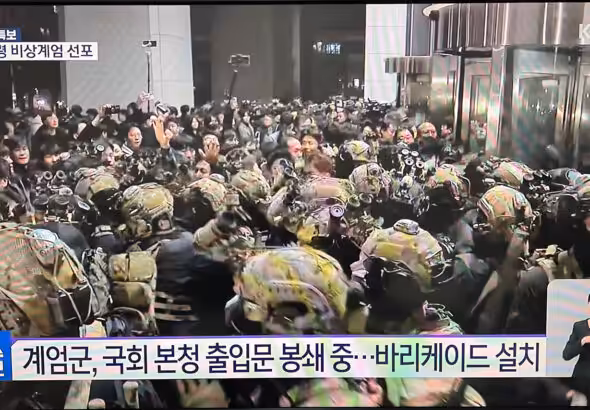 Troops gathered outside of the National Assembly amid protests. Photo: Joseph Kim/X.
