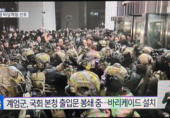 Troops gathered outside of the National Assembly amid protests. Photo: Joseph Kim/X.
