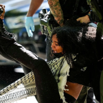 Authorities detain a protester on the campus of Emory University during a pro-Palestinian demonstration on April 25, 2024, in Atlanta. Photo: AP.