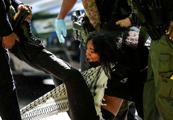 Authorities detain a protester on the campus of Emory University during a pro-Palestinian demonstration on April 25, 2024, in Atlanta. Photo: AP.