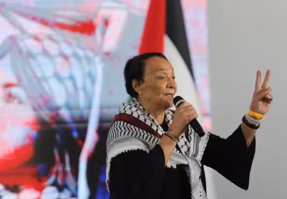 Leila Kahlid speaking at a recent international solidarity conference with Palestine in Venezuela. Photo: Resumen Latinoamericano.