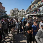 Palestinians gather to receive aid distributed by UNRWA, the UN agency helping Palestinian refugees, in Nuseirat refugee camp, Gaza, Palestine, on November 5, 2024. Photo: Al Mayadeen.