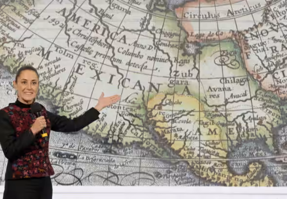 Mexico's President Claudia Sheinbaum displays a 17th-century world map showing "America Mexicana" -- pushing back at Donald Trump. Photo: Claudia Sheinbaum Pardo/X