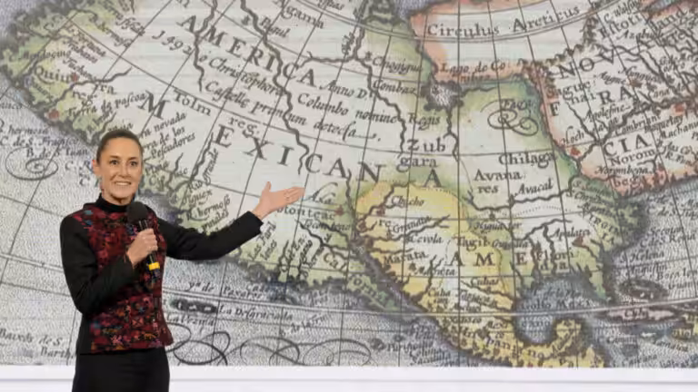 Mexico's President Claudia Sheinbaum displays a 17th-century world map showing "America Mexicana" -- pushing back at Donald Trump. Photo: Claudia Sheinbaum Pardo/X