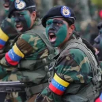 Venezuelan female soldiers march during a military parade marking Venezuela's Independence Day. Photo: Ariana Cubillos/AP/file photo.