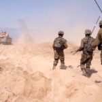 Israeli occupation forces are seen in the south of the besieged Gaza Strip on March 3, 2024. Photo: AP.