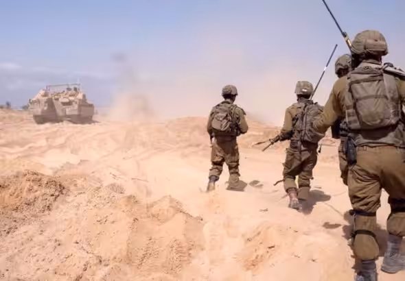 Israeli occupation forces are seen in the south of the besieged Gaza Strip on March 3, 2024. Photo: AP.