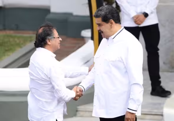 Colombian President Gustavo Petro (left) being welcomed by Venezuelan President Nicolás Maduro during the former's official visit to Venezuela in April 2024. File photo.