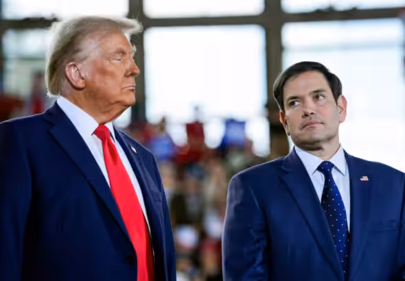 US President-elect Donald Trump and his pick for secretary of State, Marco Rubio, at a campaign rally in November 2024. Photo: Evan Vucci/AP.
