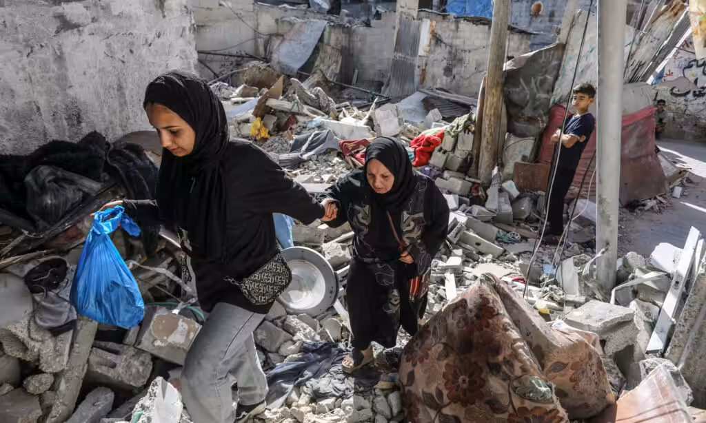 Palestinians in Nuseirat camp, Gaza Strip, after an Israeli bombardment. Photo: Abed Rahim Khatib/Zuma Press.
