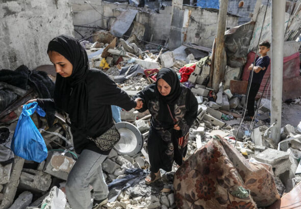 Palestinians in Nuseirat camp, Gaza Strip, after an Israeli bombardment. Photo: Abed Rahim Khatib/Zuma Press.