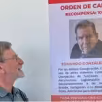 Roger D. Harris views wanted poster for González at the Caracas airport. Photo: Roger Harris.